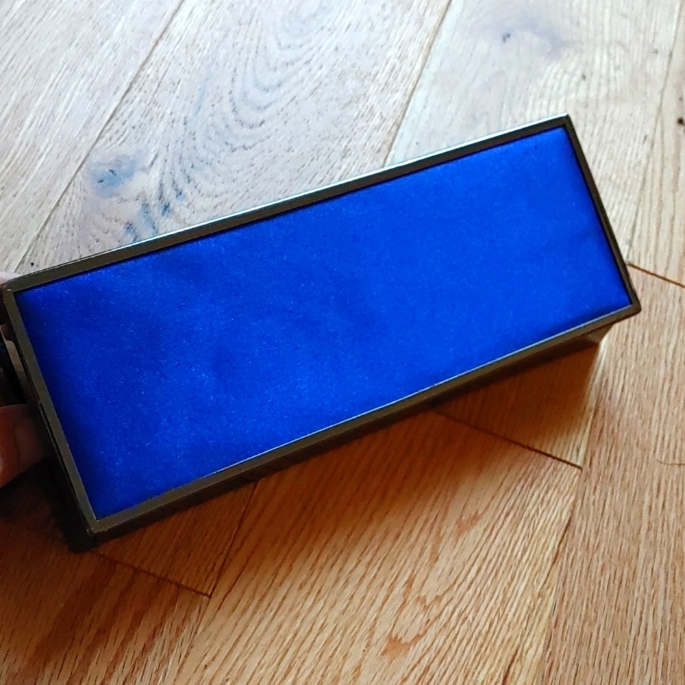 Call it Spring. Clutch. Like new. Metallic and Blue.